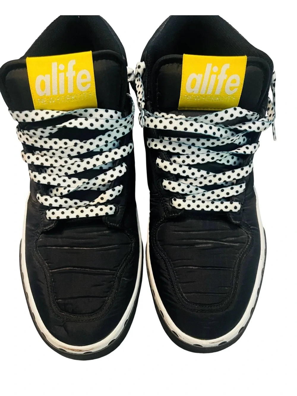 Alife Black High-Top Sneakers with Yellow Logo and White Polka Dot Laces